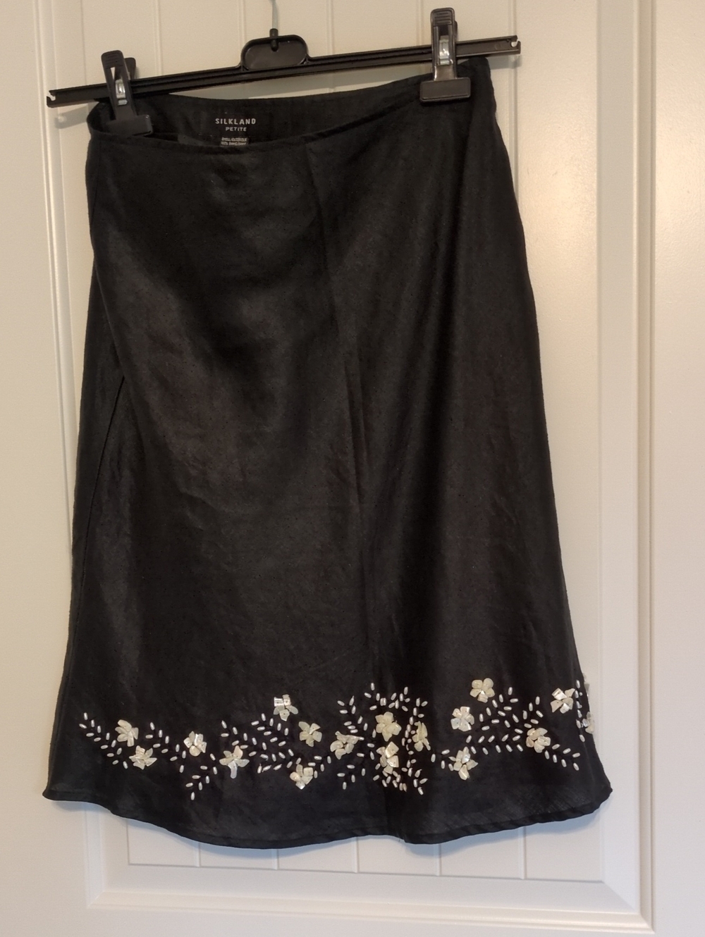 SilkLand Black A-Line Midi Skirt with White Floral Hem